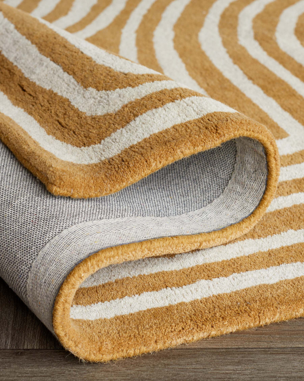 Abstract Swirl ochre wool medium rug