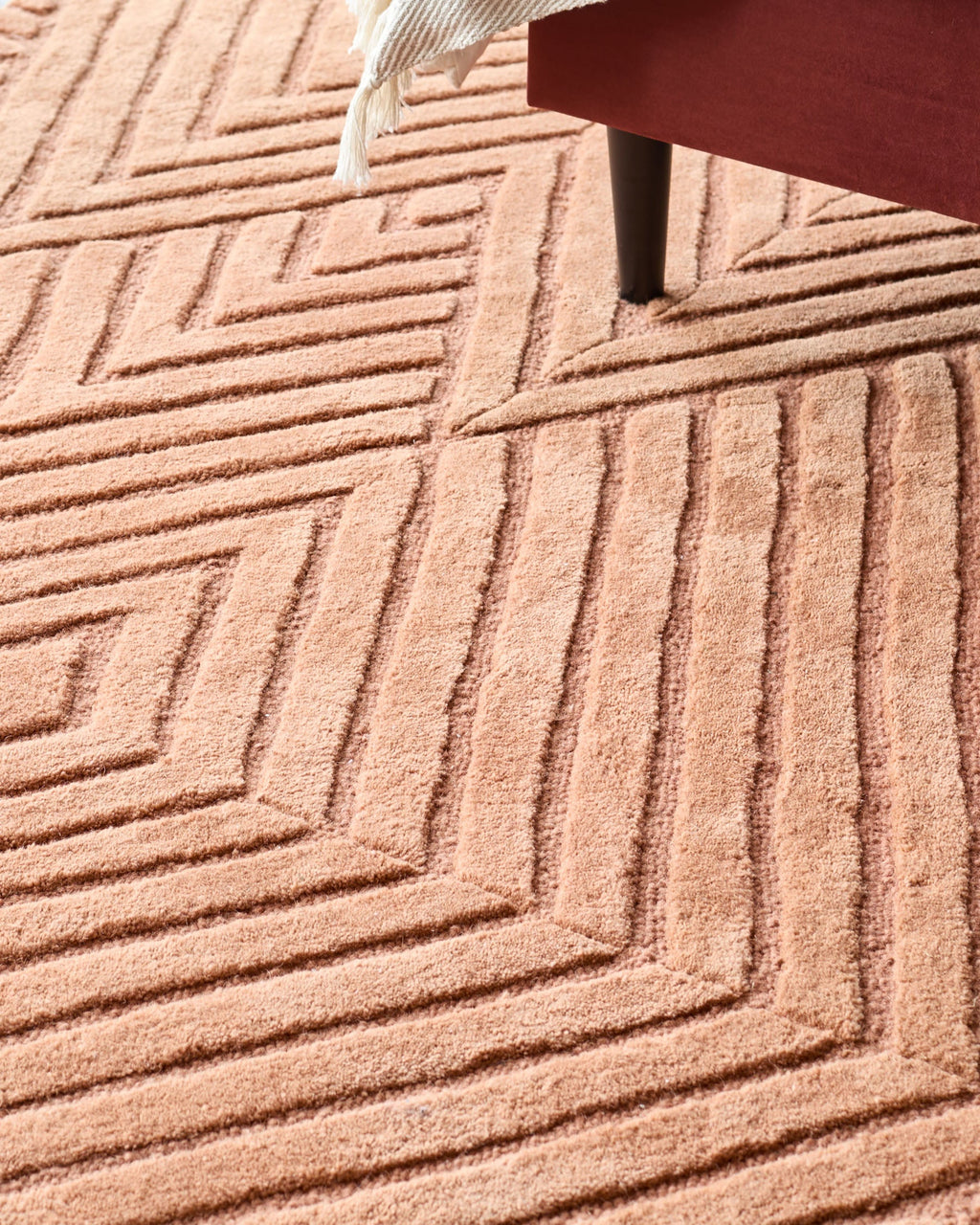 Abstract Point terracotta textured medium rug