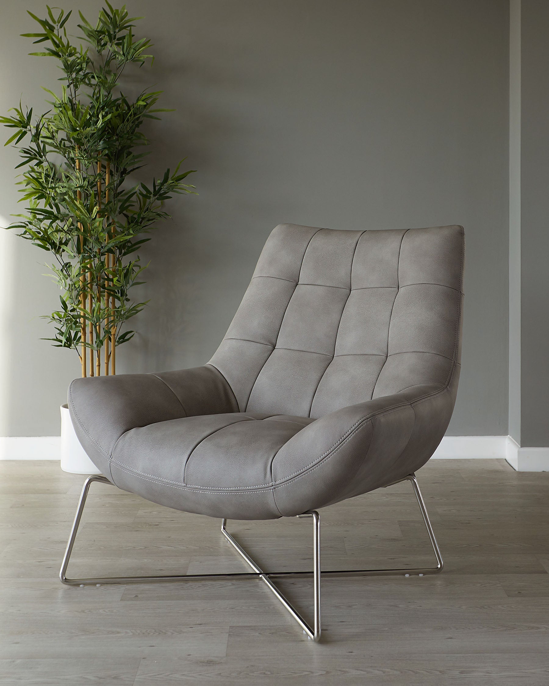 Canio Grey Faux Leather And Brushed Steel Accent Chair