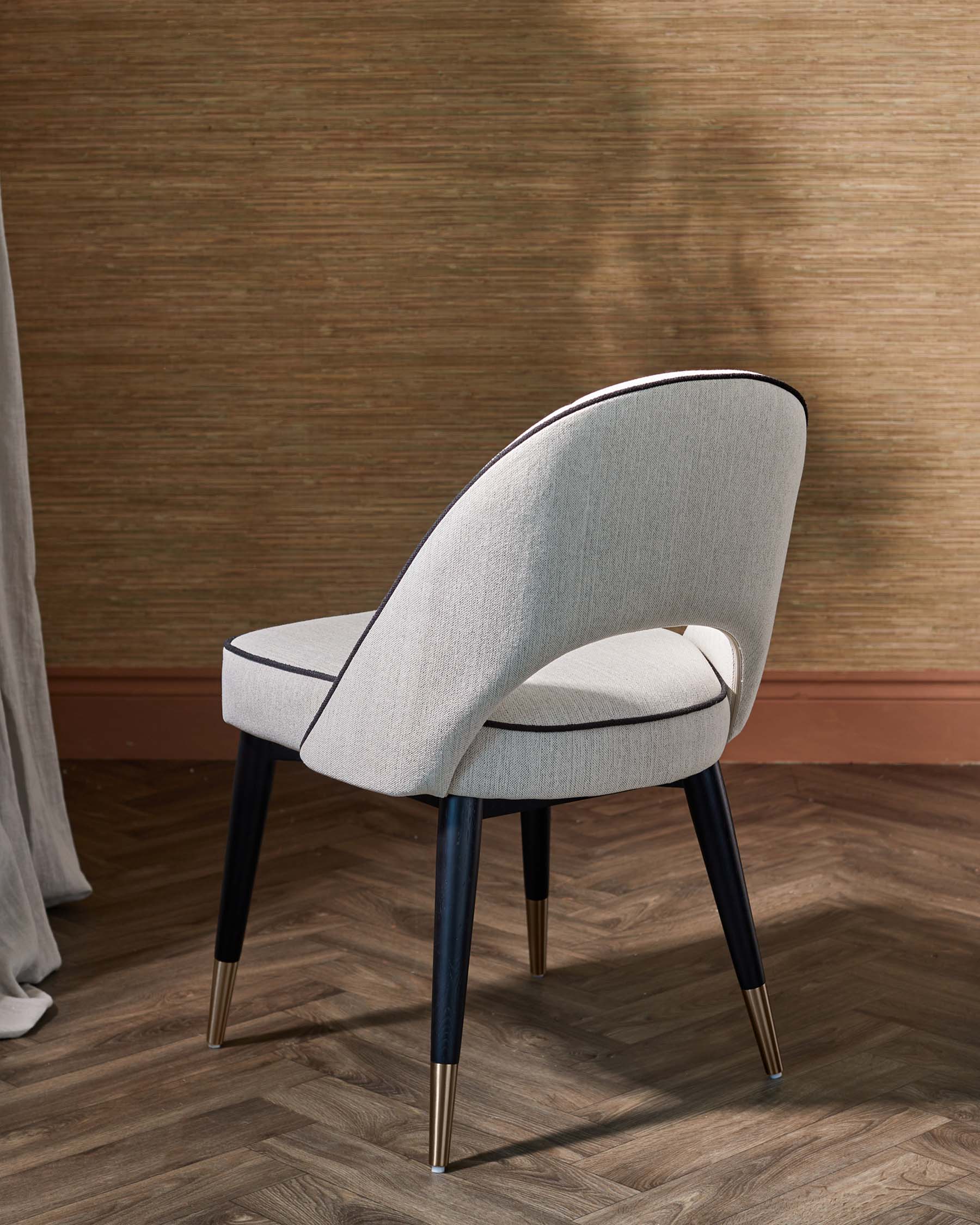 Clover ivory dual tone fabric dining chair with bronze legs