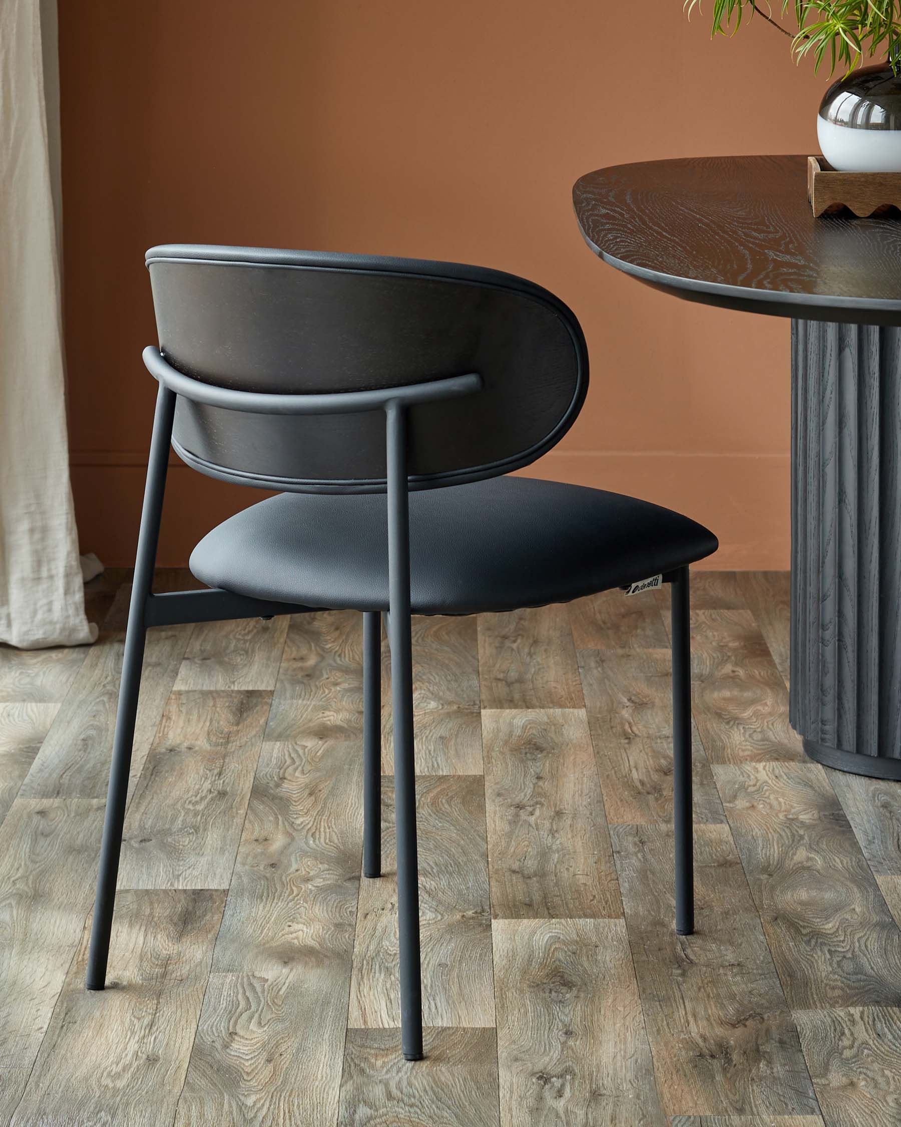Cree black faux leather dining chair
