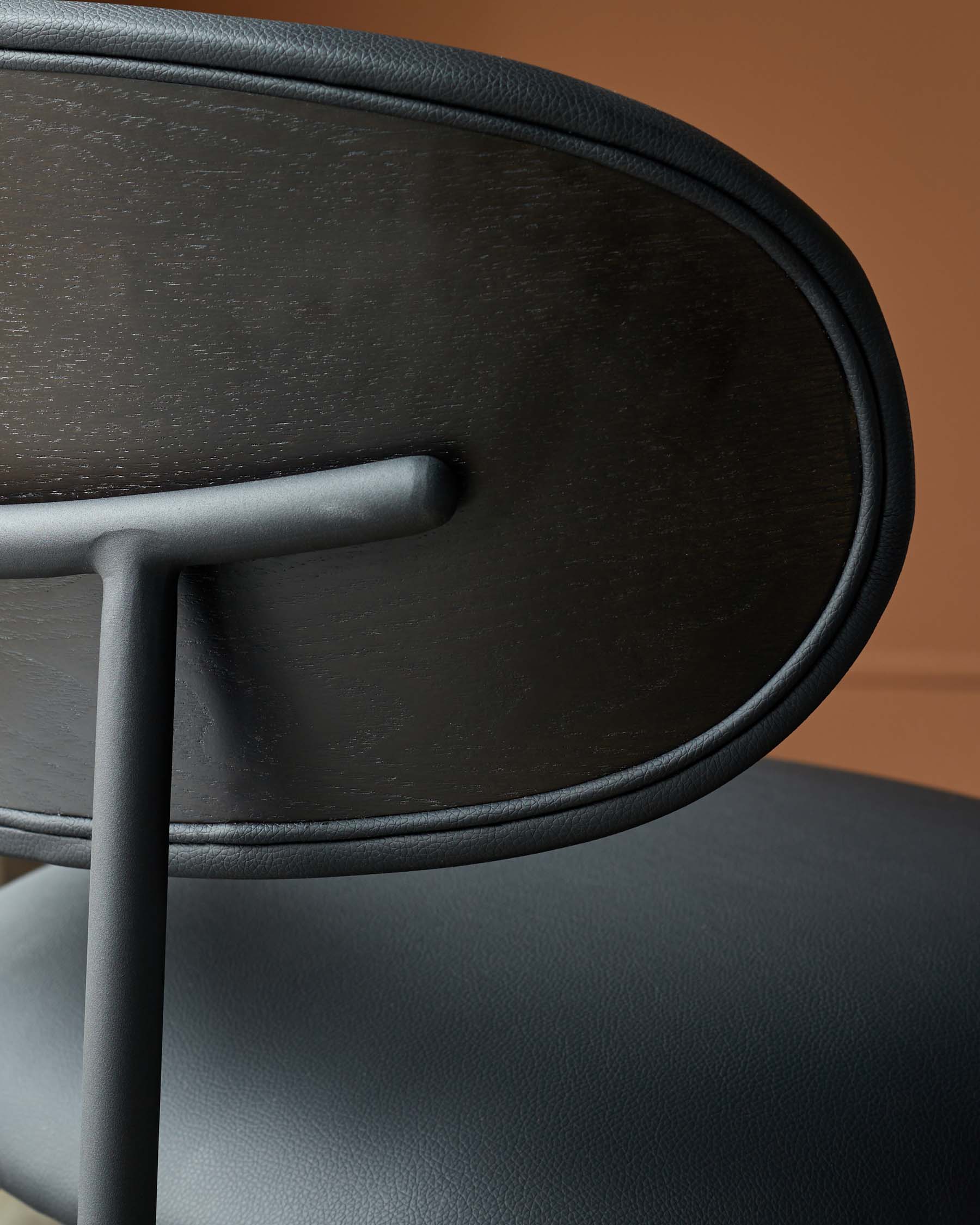 Cree black faux leather dining chair