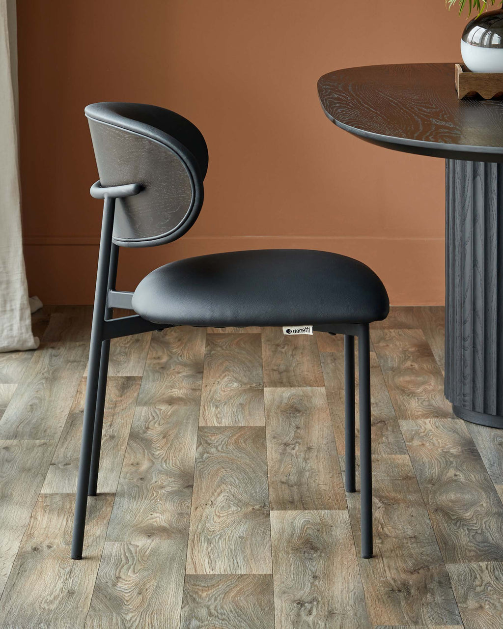 Cree black faux leather dining chair
