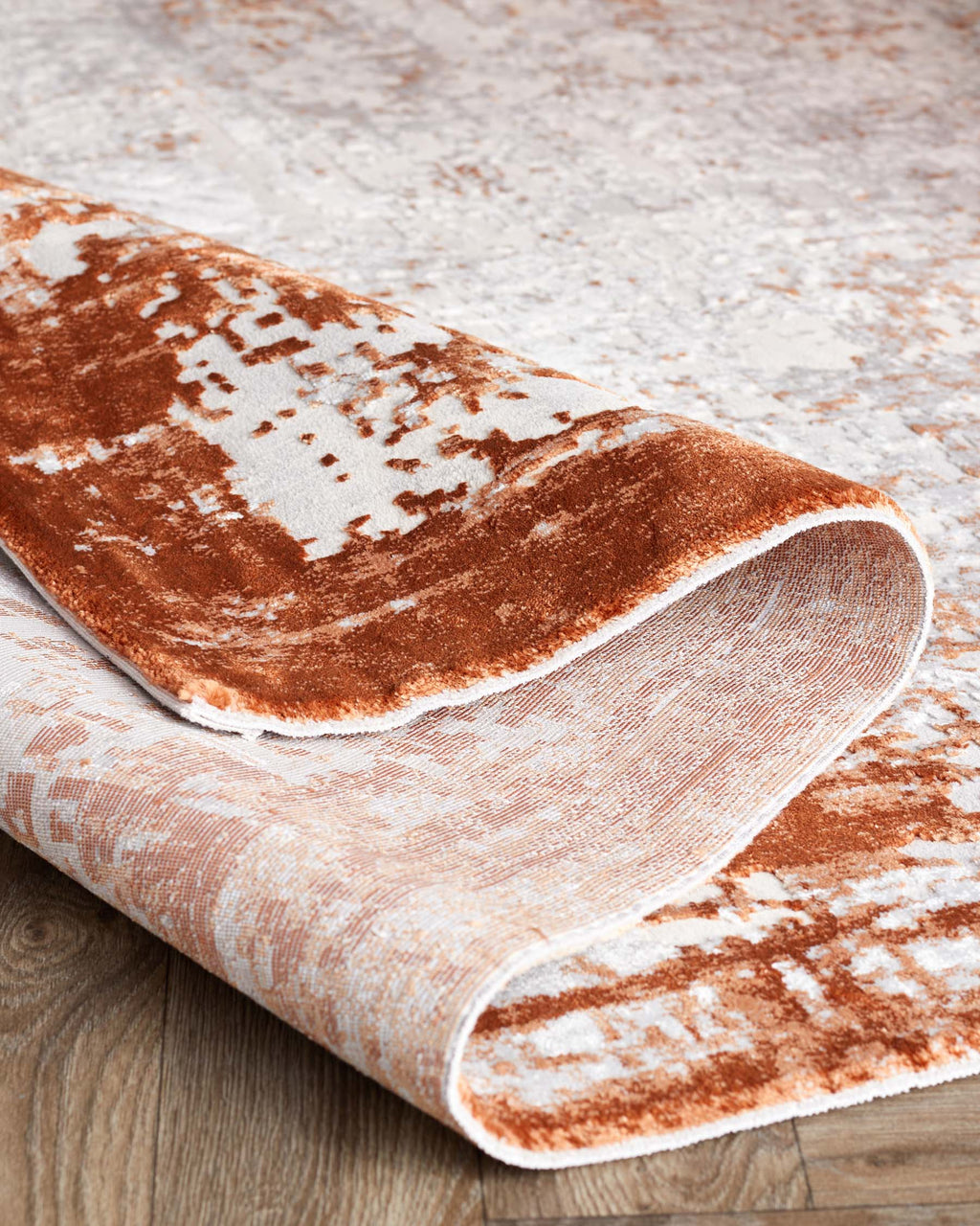 Distressed rust textured medium rug