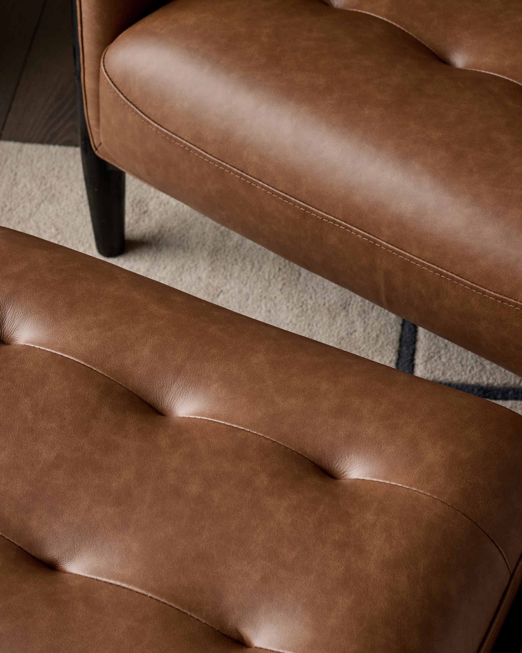 Ember tan leather occasional chair with footstool