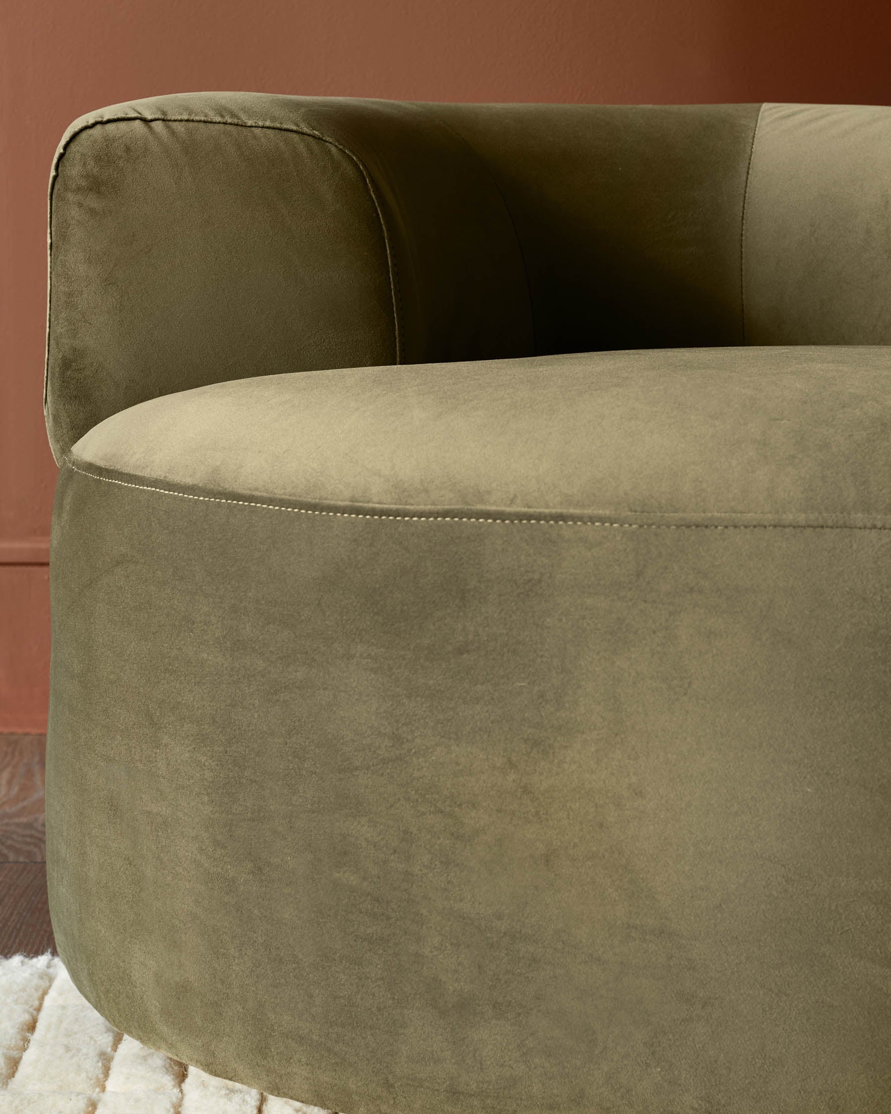Gianna olive green velvet swivel armchair