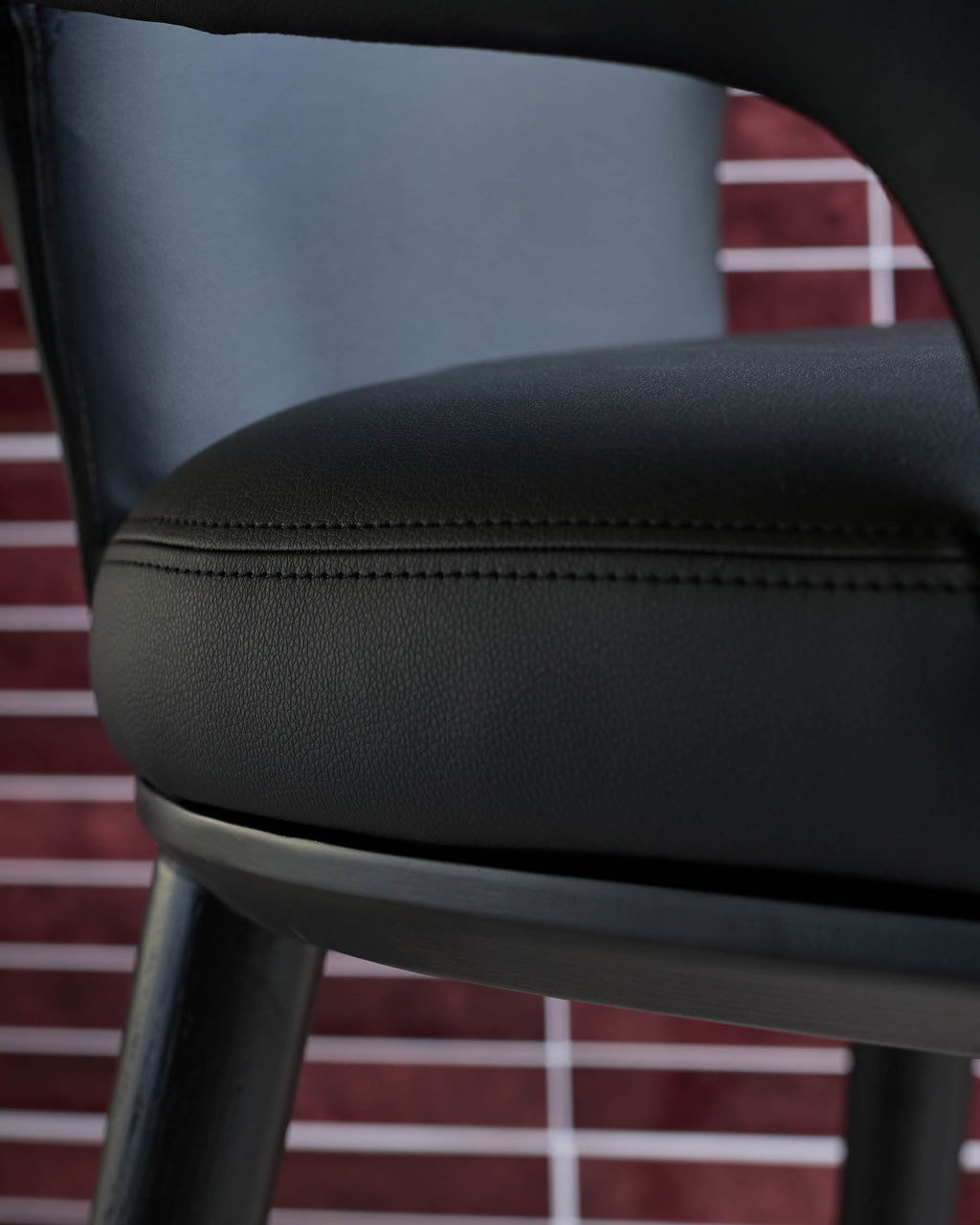 Heath black faux leather bar stool