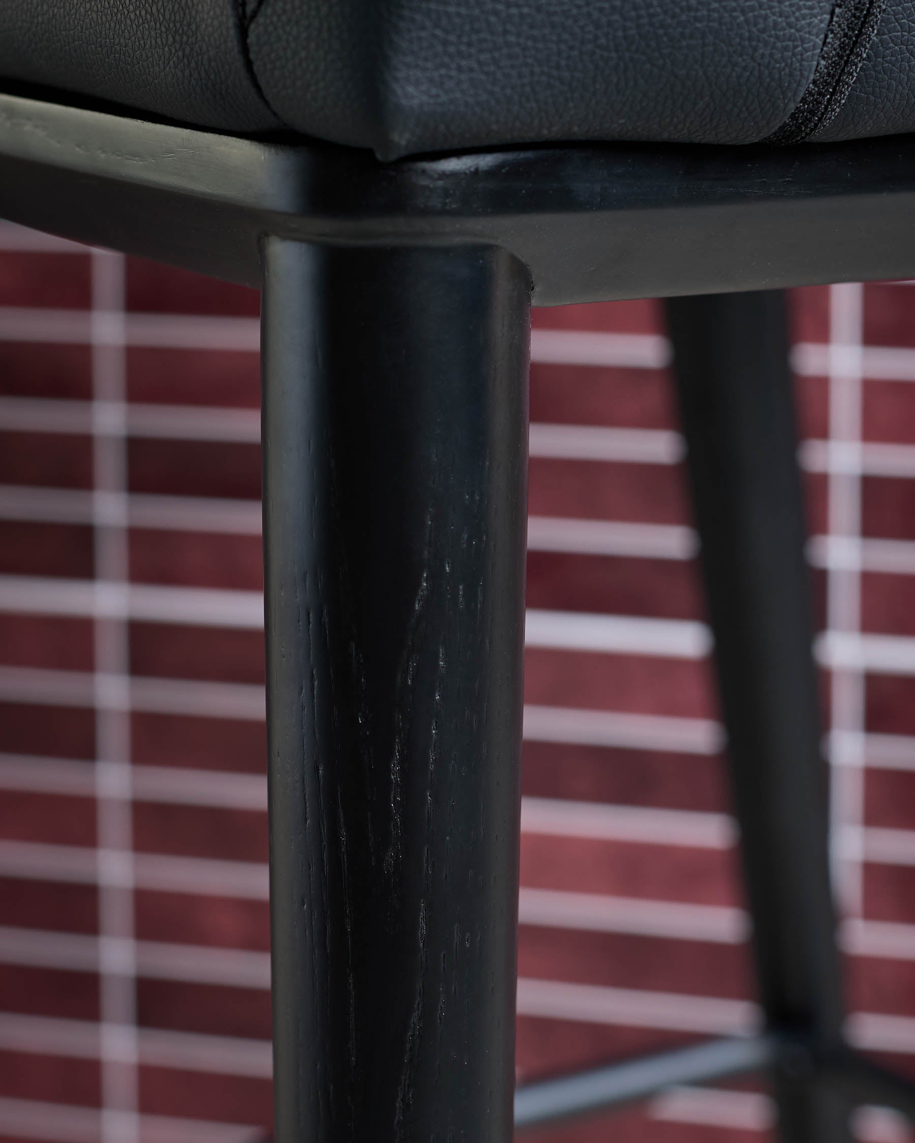 Heath black faux leather bar stool