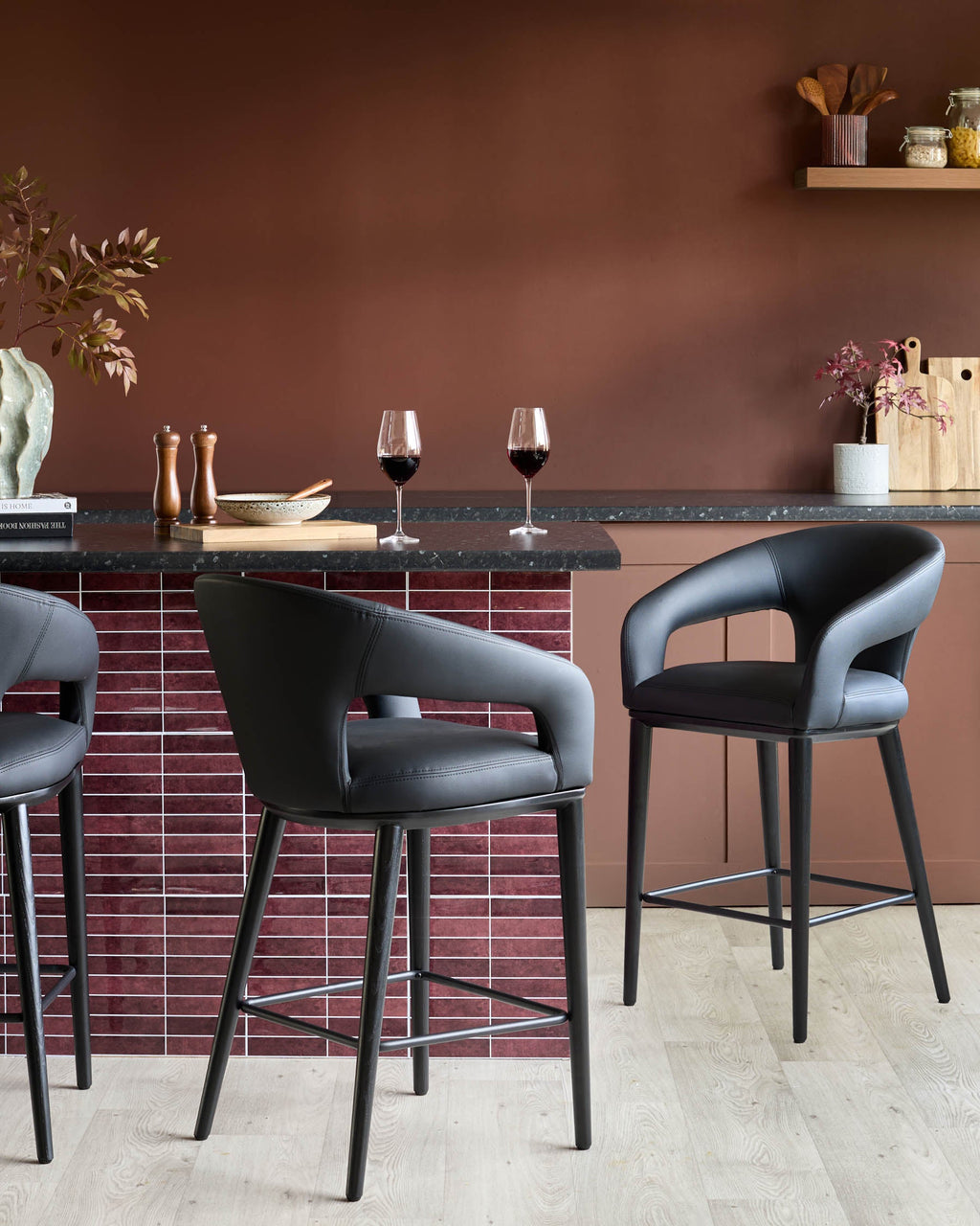 Heath black faux leather bar stool
