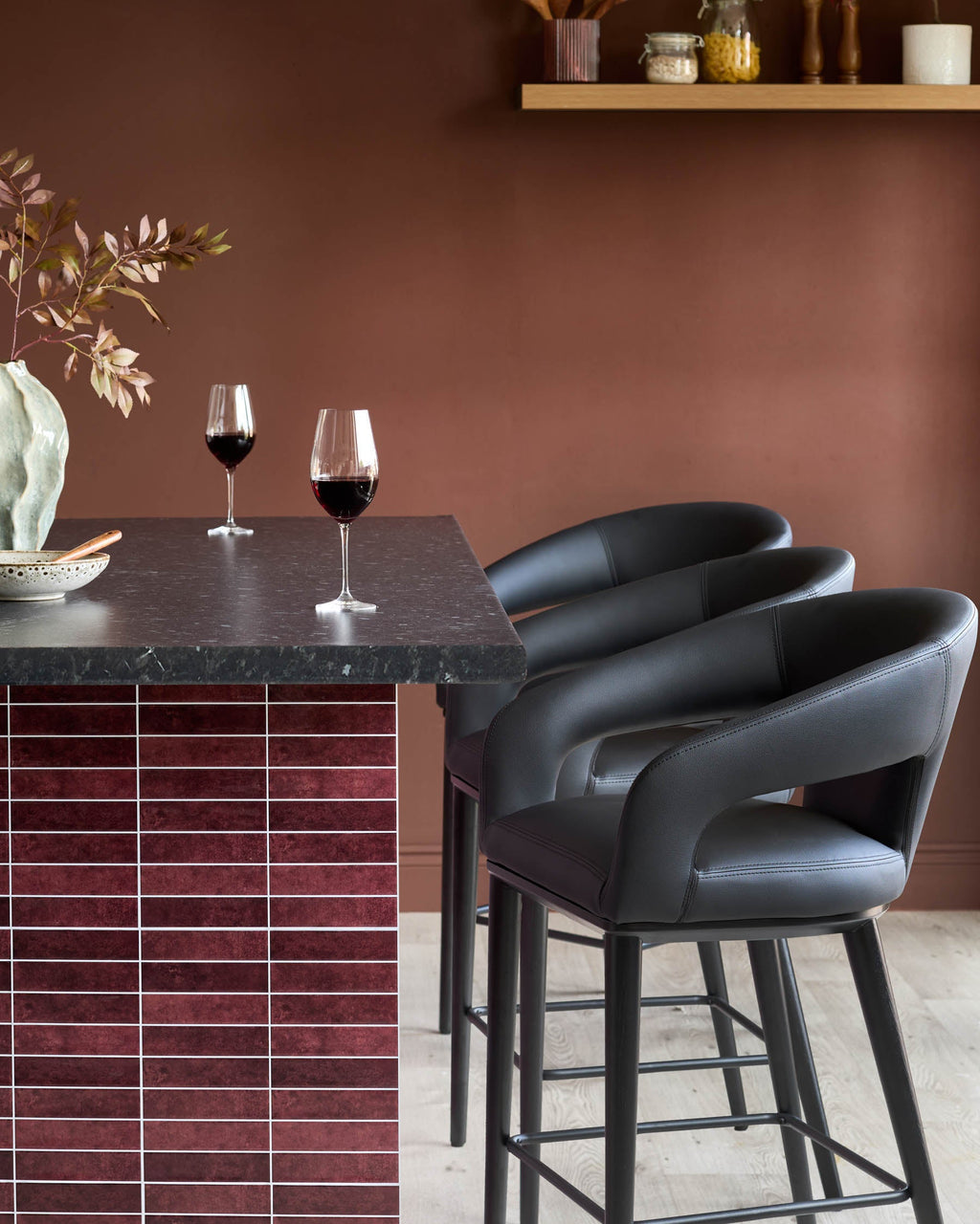 Heath black faux leather bar stool