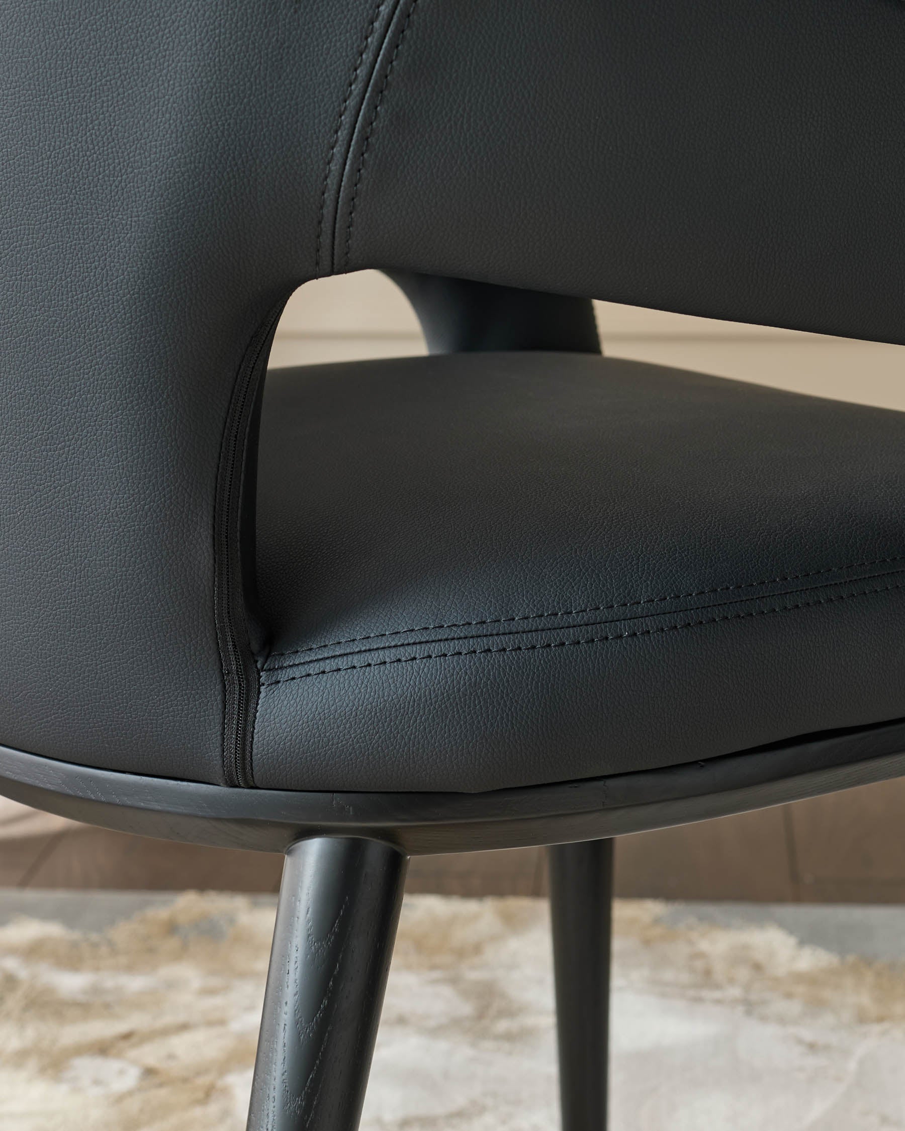 Heath black faux leather dining chair