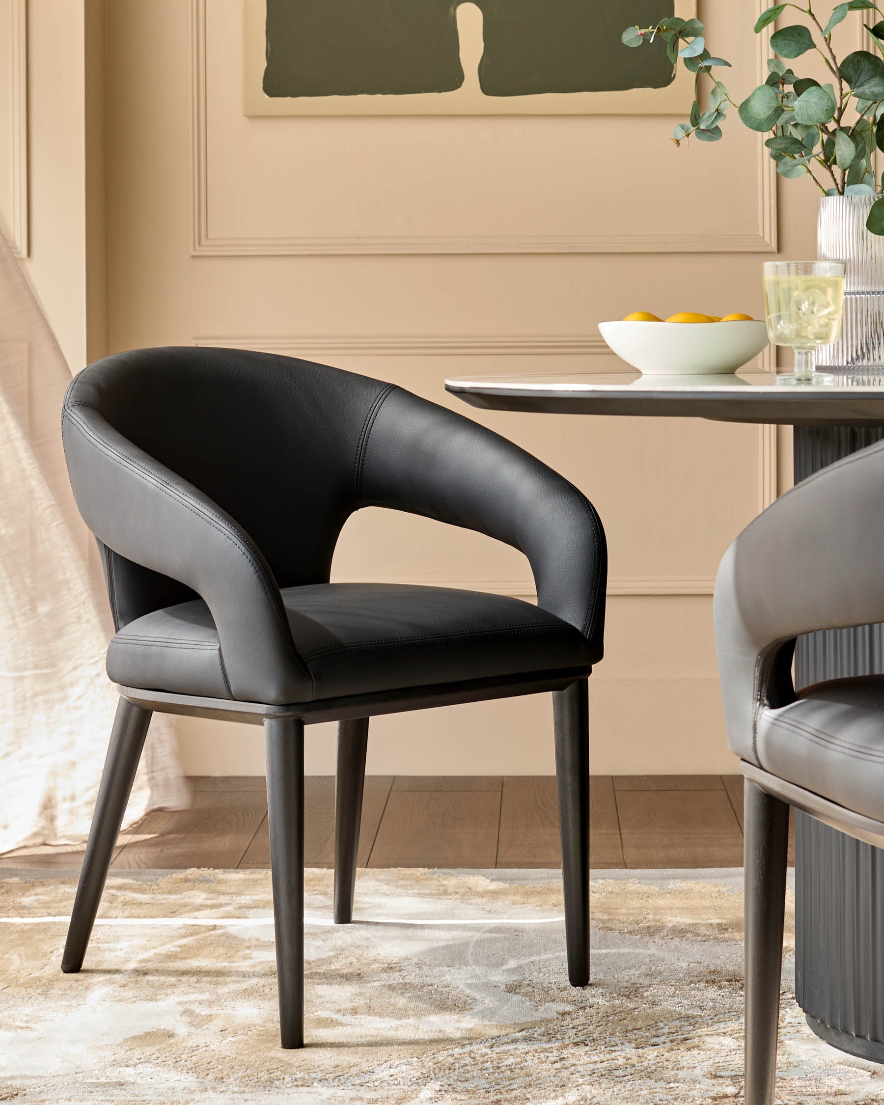 Heath black faux leather dining chair