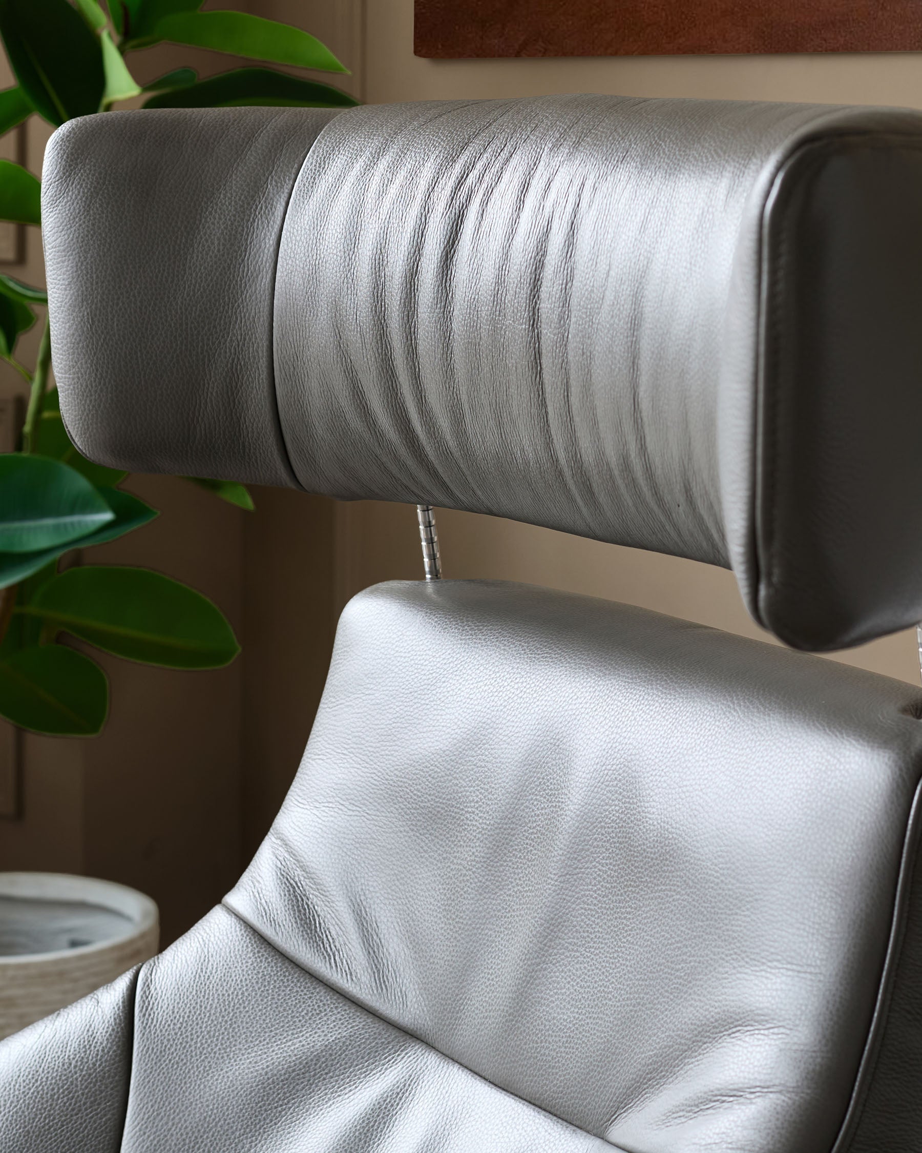 Karma dark grey leather swivel recliner accent chair and footstool