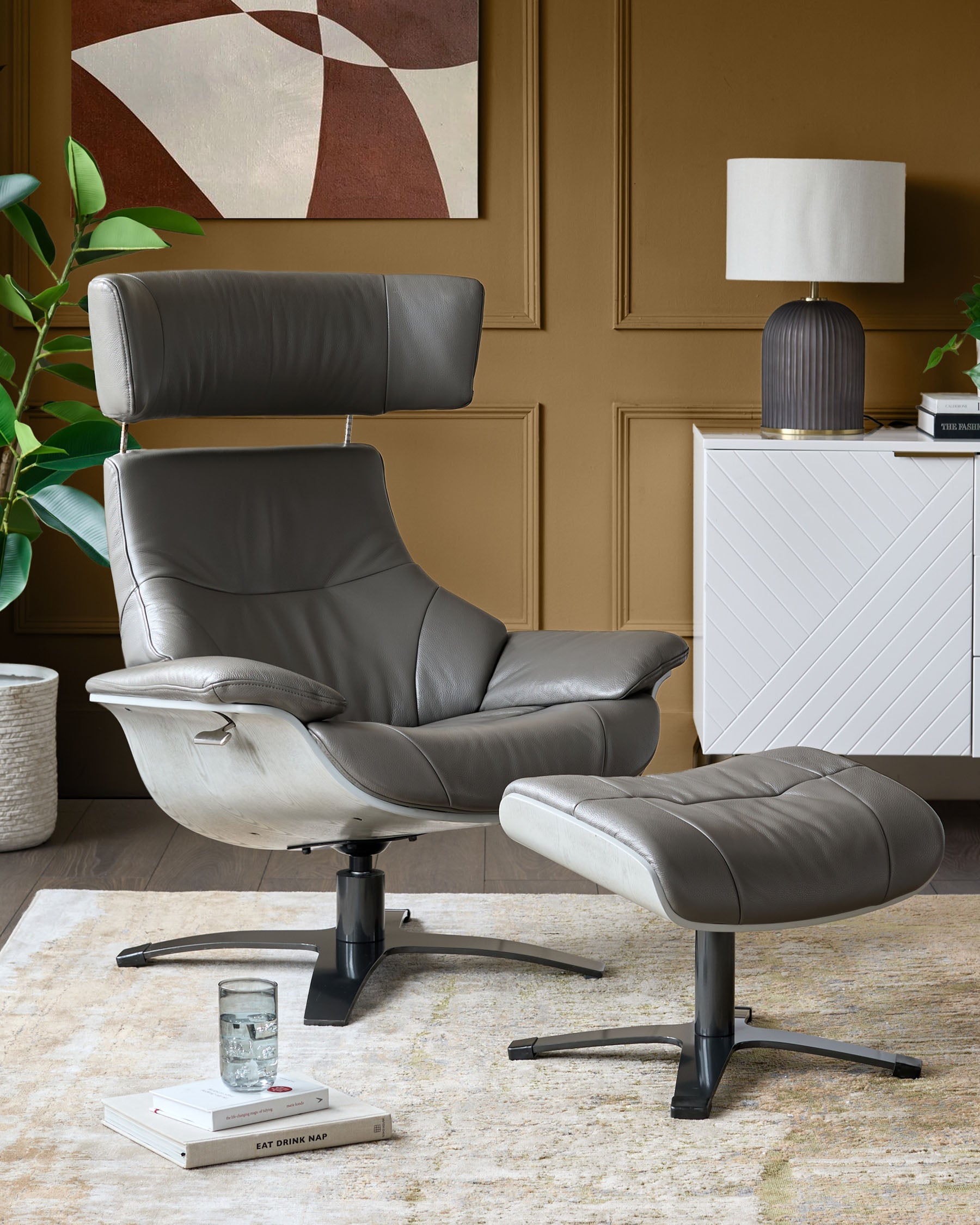 Karma dark grey leather swivel recliner accent chair and footstool