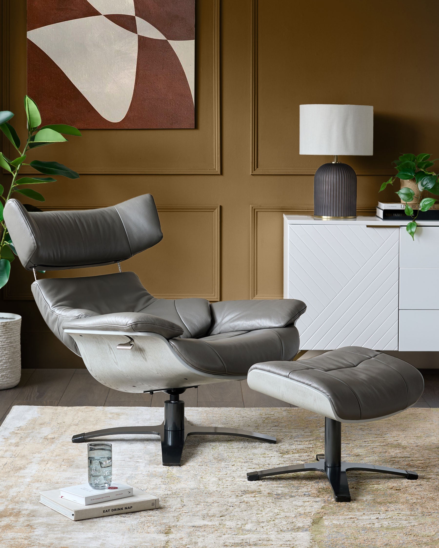 Karma dark grey leather swivel recliner accent chair and footstool