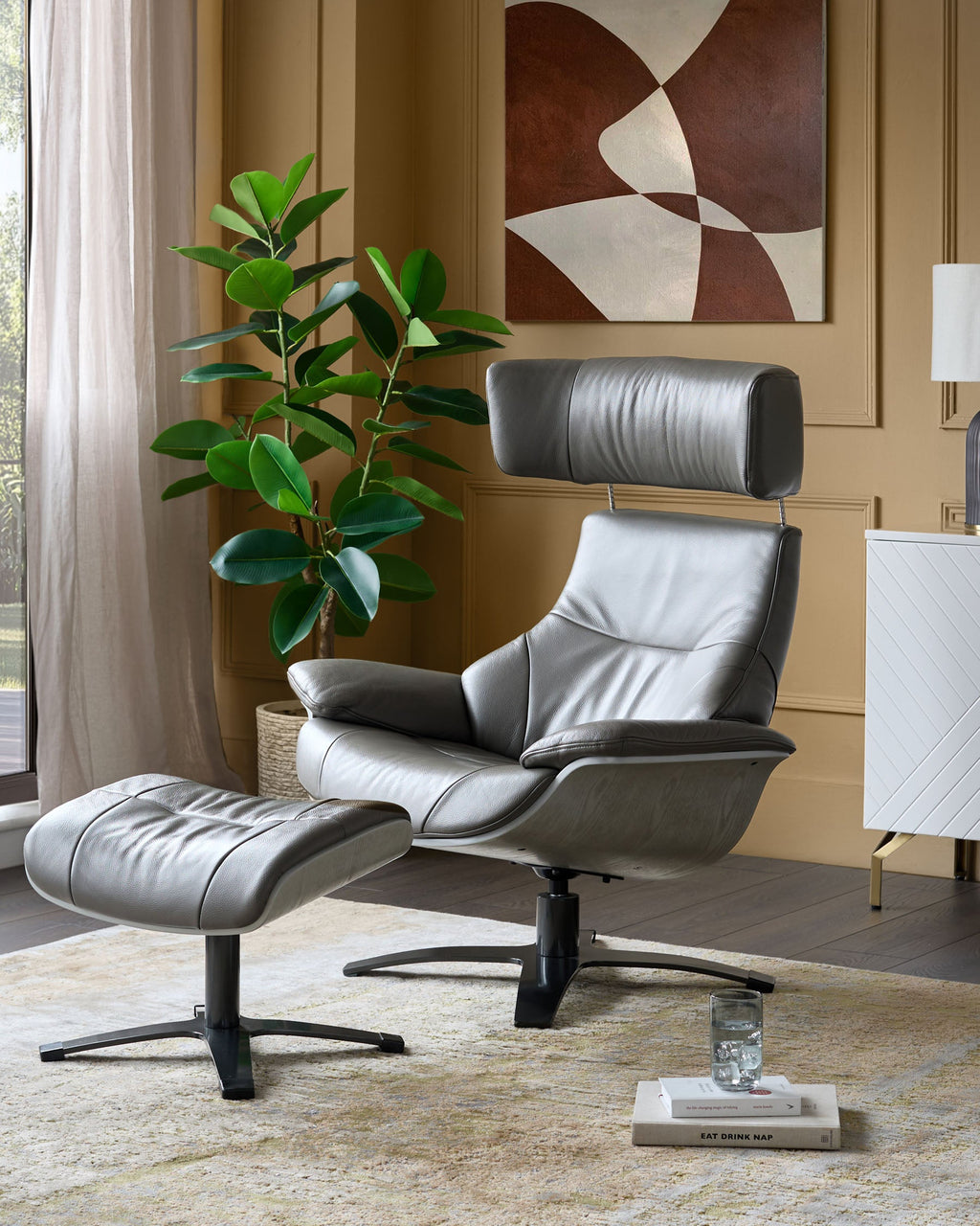 Karma dark grey leather swivel recliner accent chair and footstool