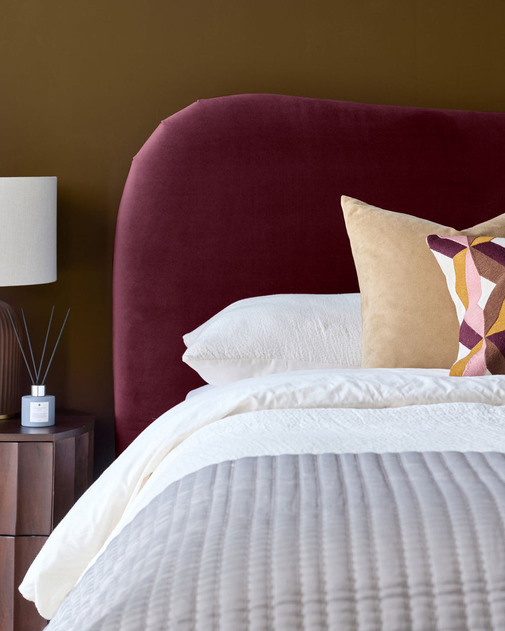 Lani plum velvet king size ottoman bed