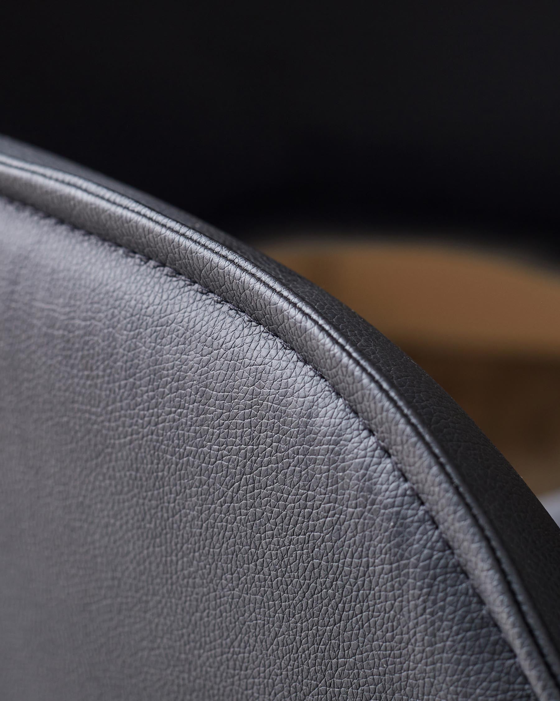 Marlow black faux leather swivel dining chair