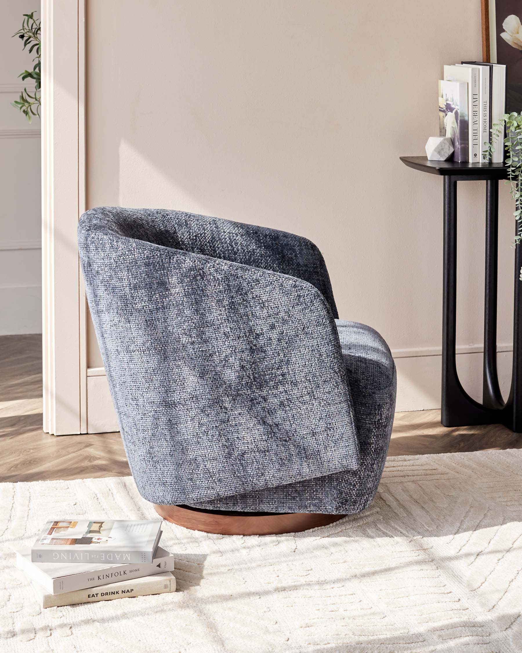 Natalia dark blue chunky weave swivel accent chair