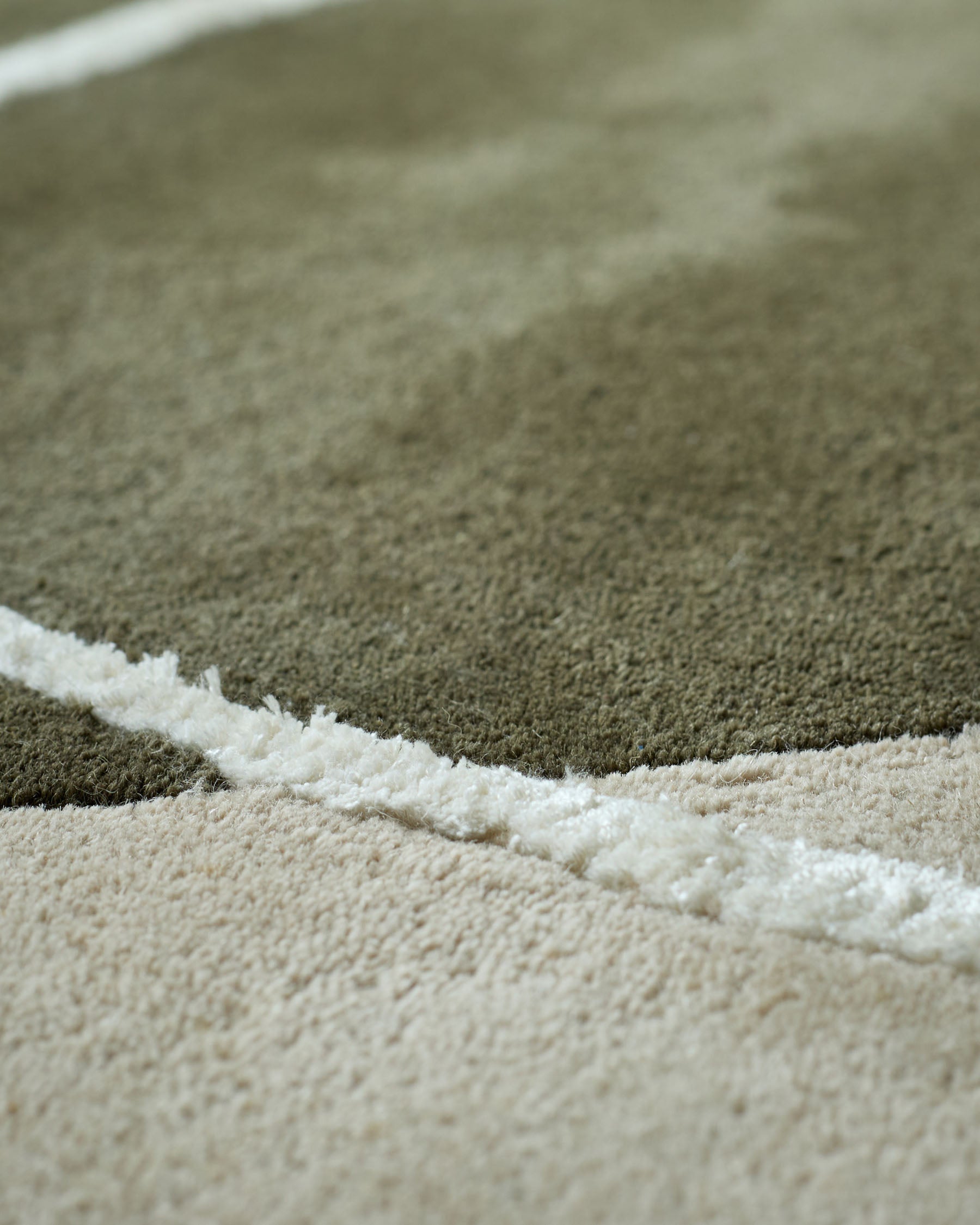 Neo olive and navy textured medium rug