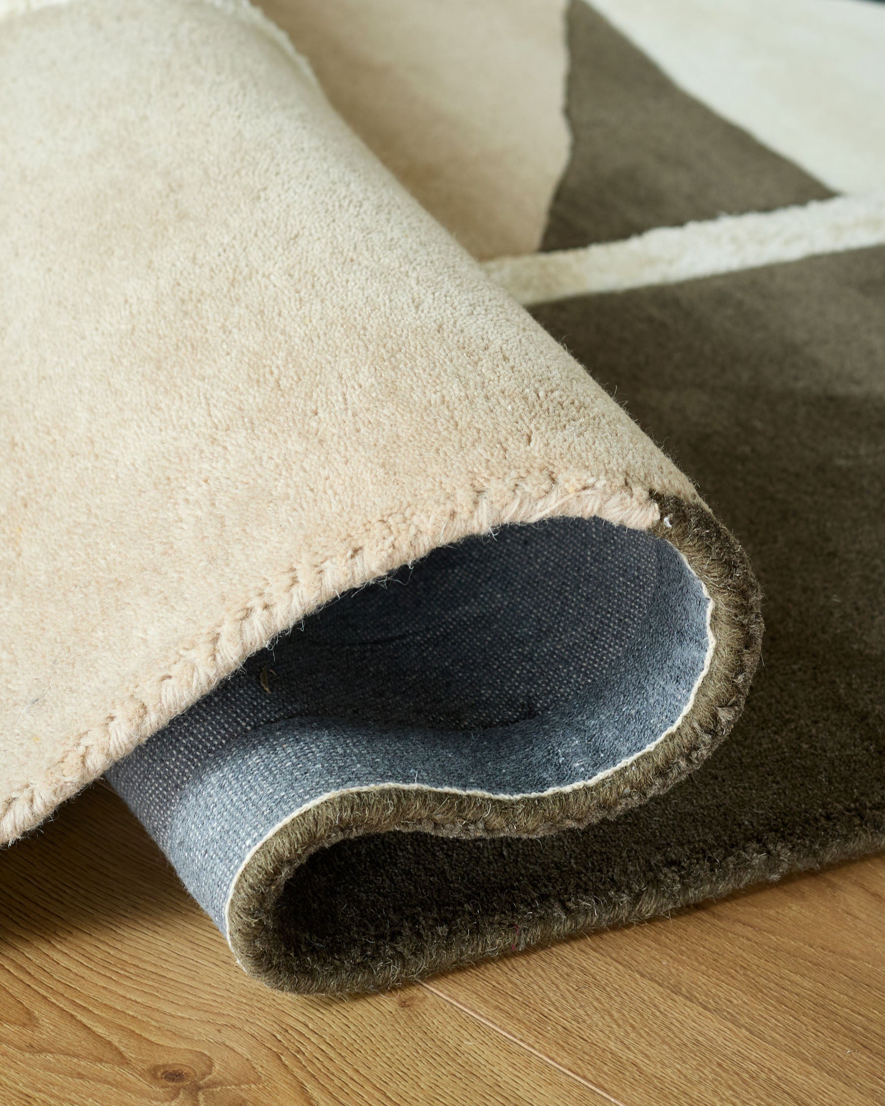 Neo olive and navy textured large rug