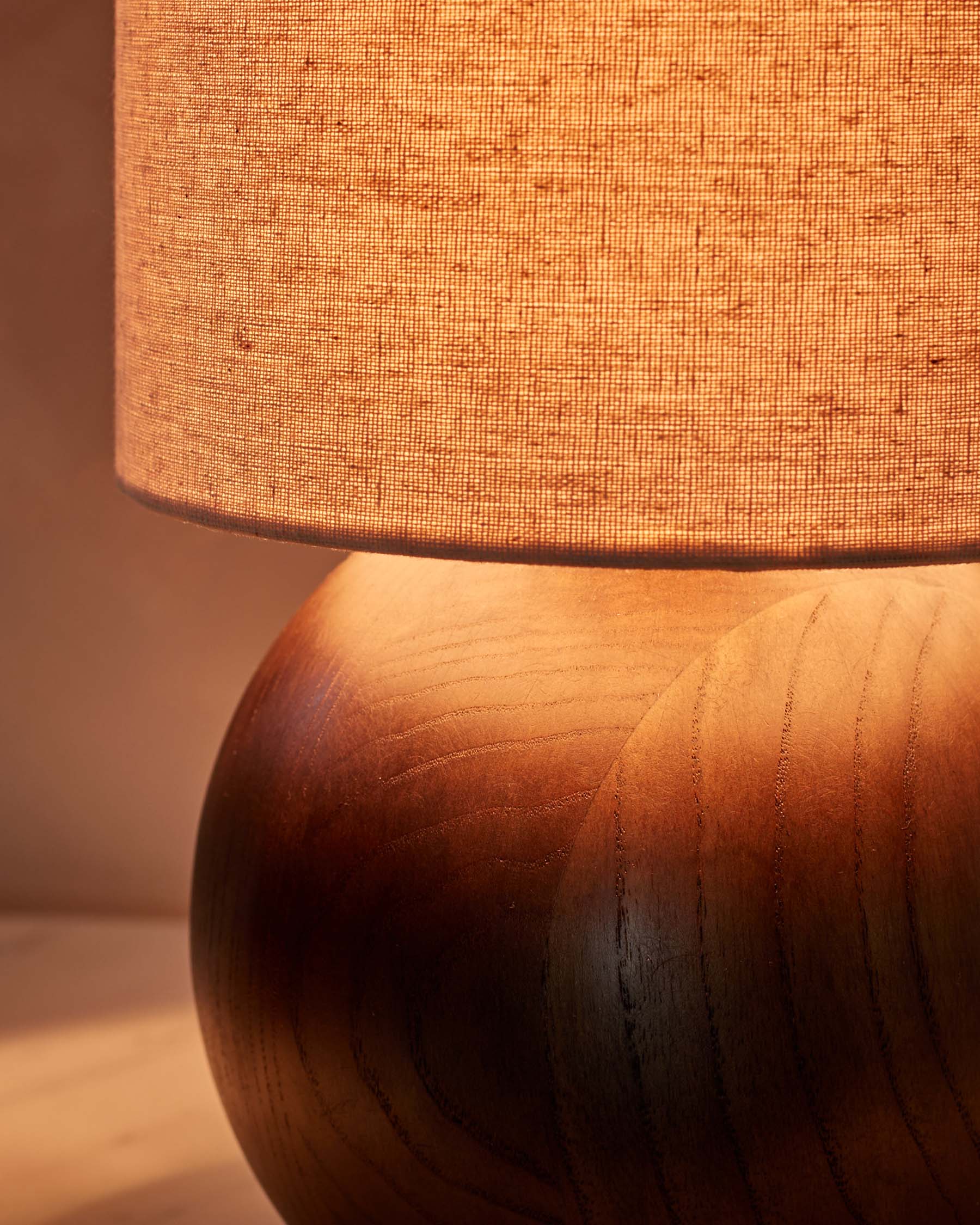 Orlan natural linen and dark wood table lamp