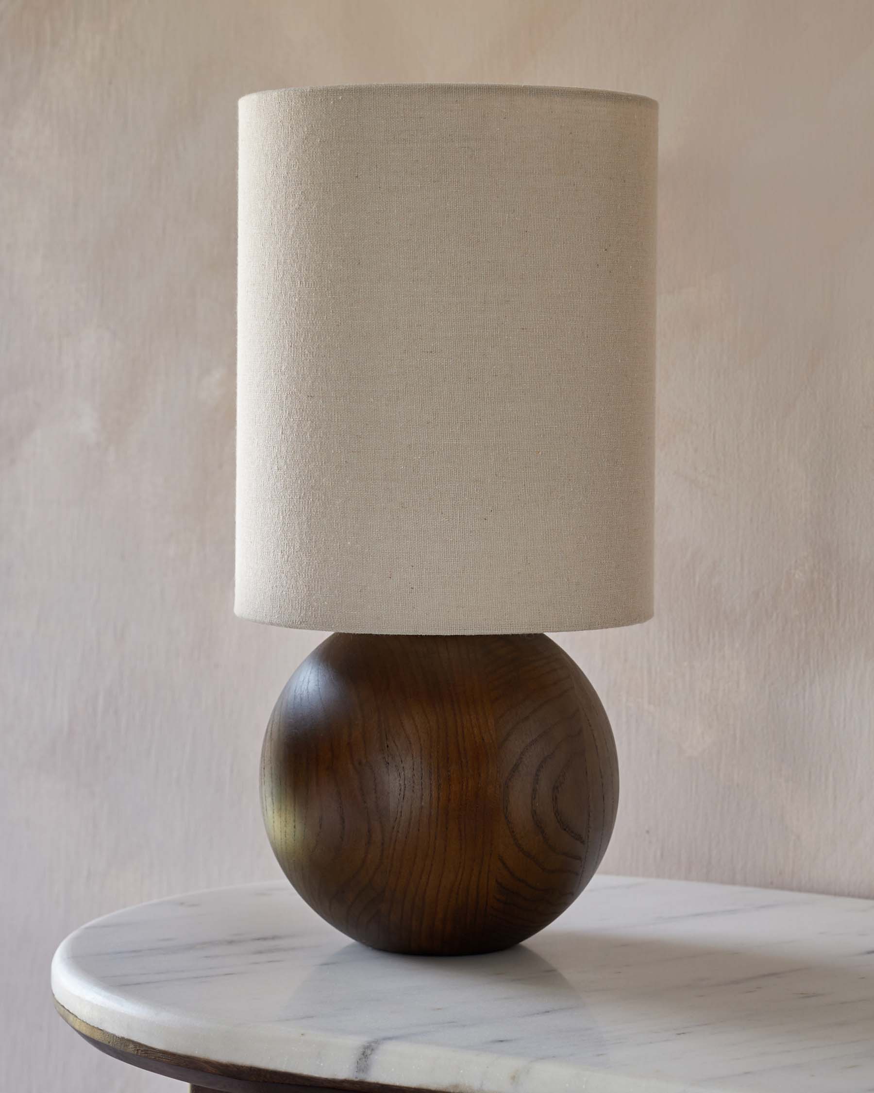 Orlan natural linen and dark wood table lamp