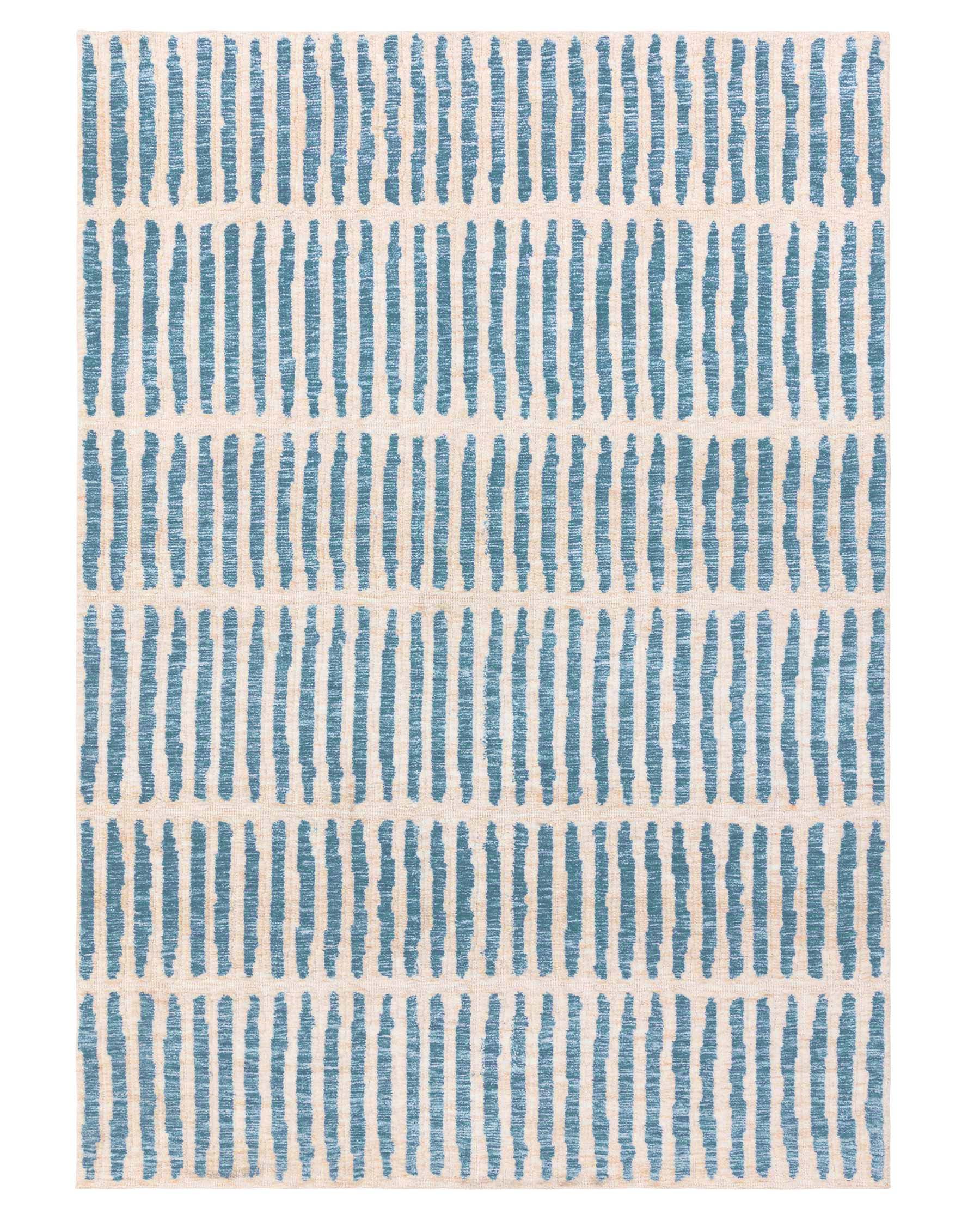 Raine cream and blue textured medium rug
