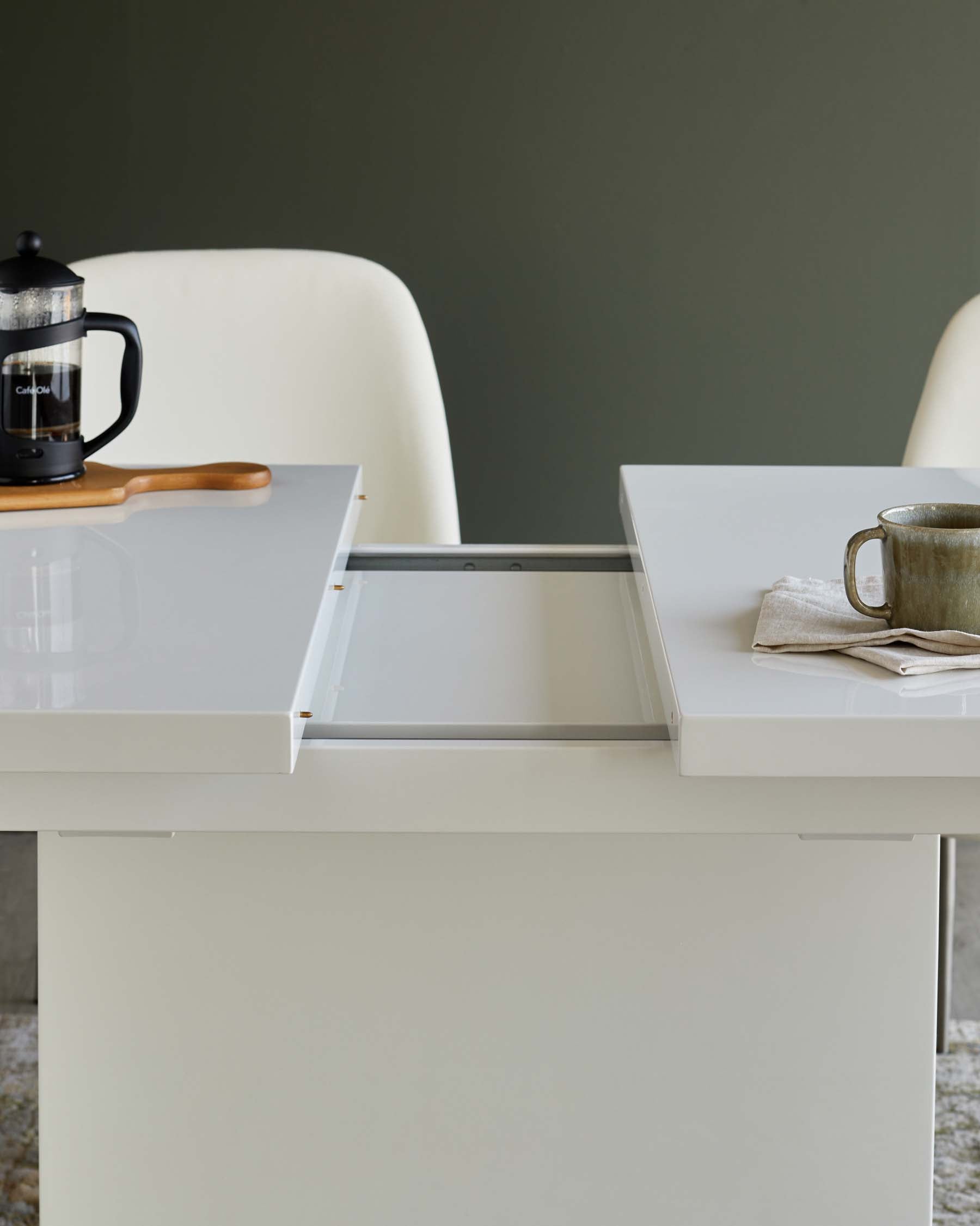 Sanza white gloss extending 6 to 10 seater dining table