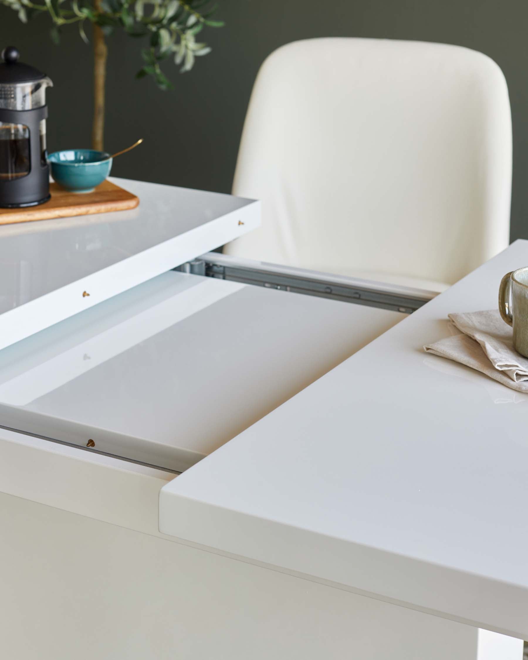 Sanza white gloss extending 6 to 10 seater dining table