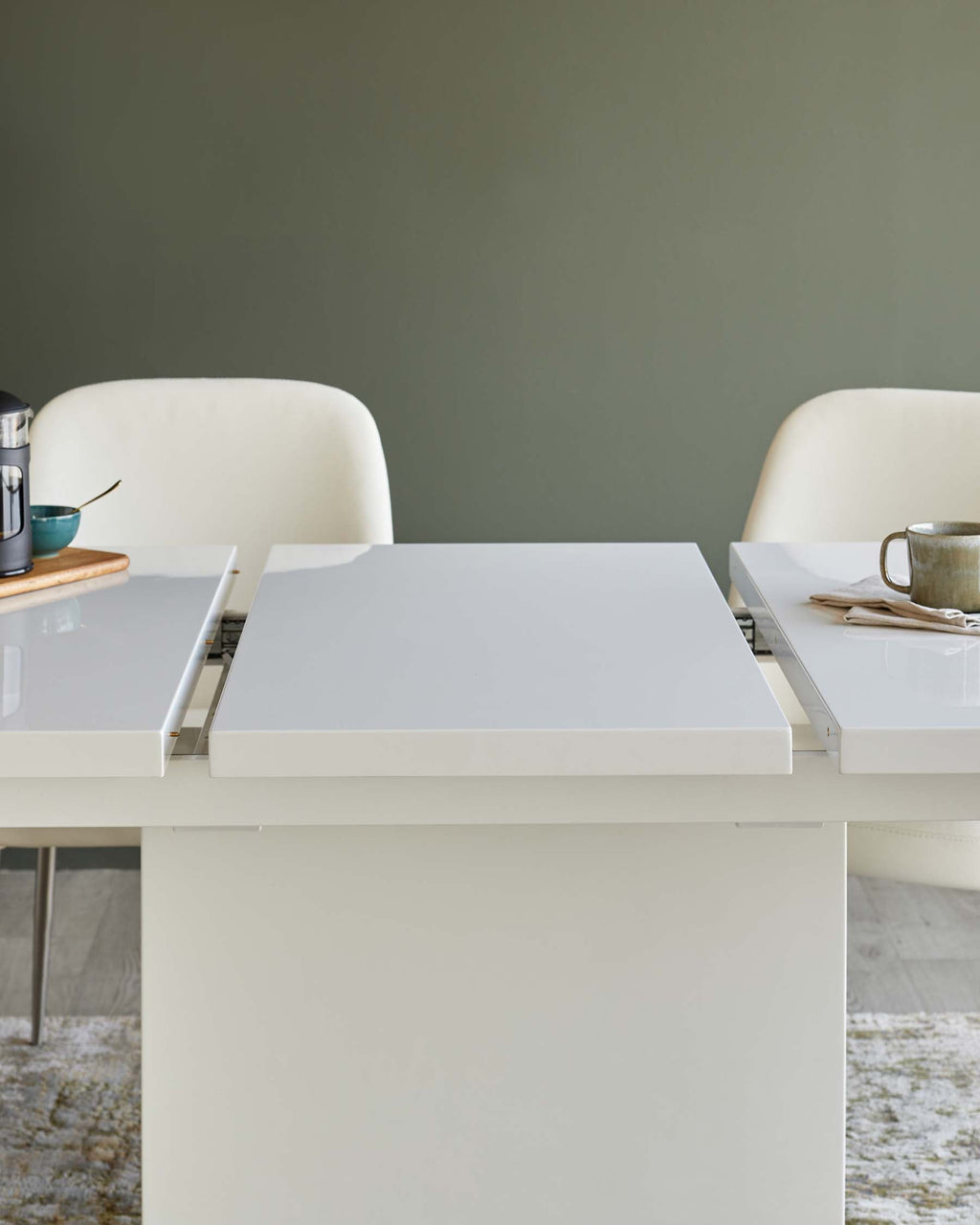 Sanza white gloss extending 6 to 10 seater dining table