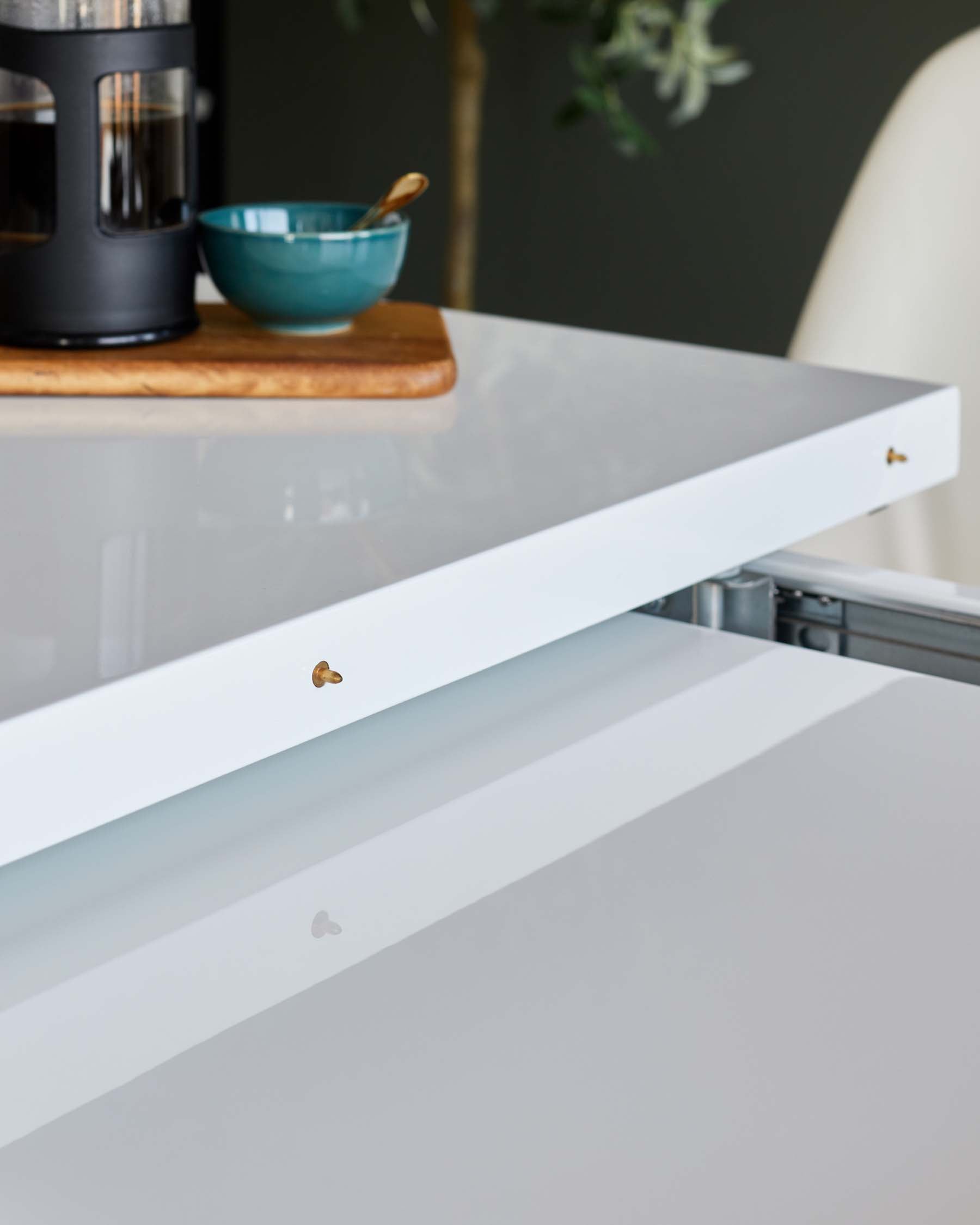 Sanza white gloss extending 6 to 10 seater dining table