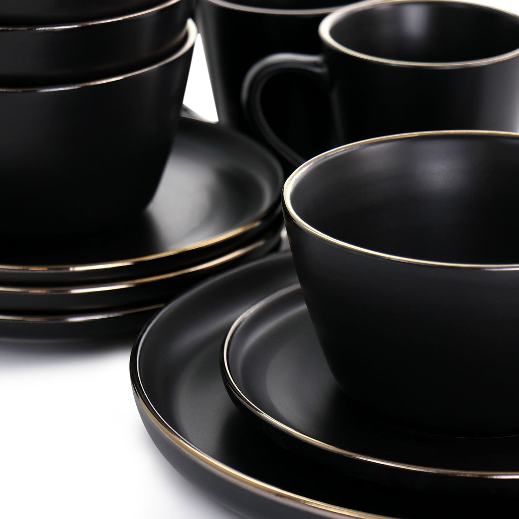 Stoneware Dinnerware 16 Piece Set in Black with Gold Rim