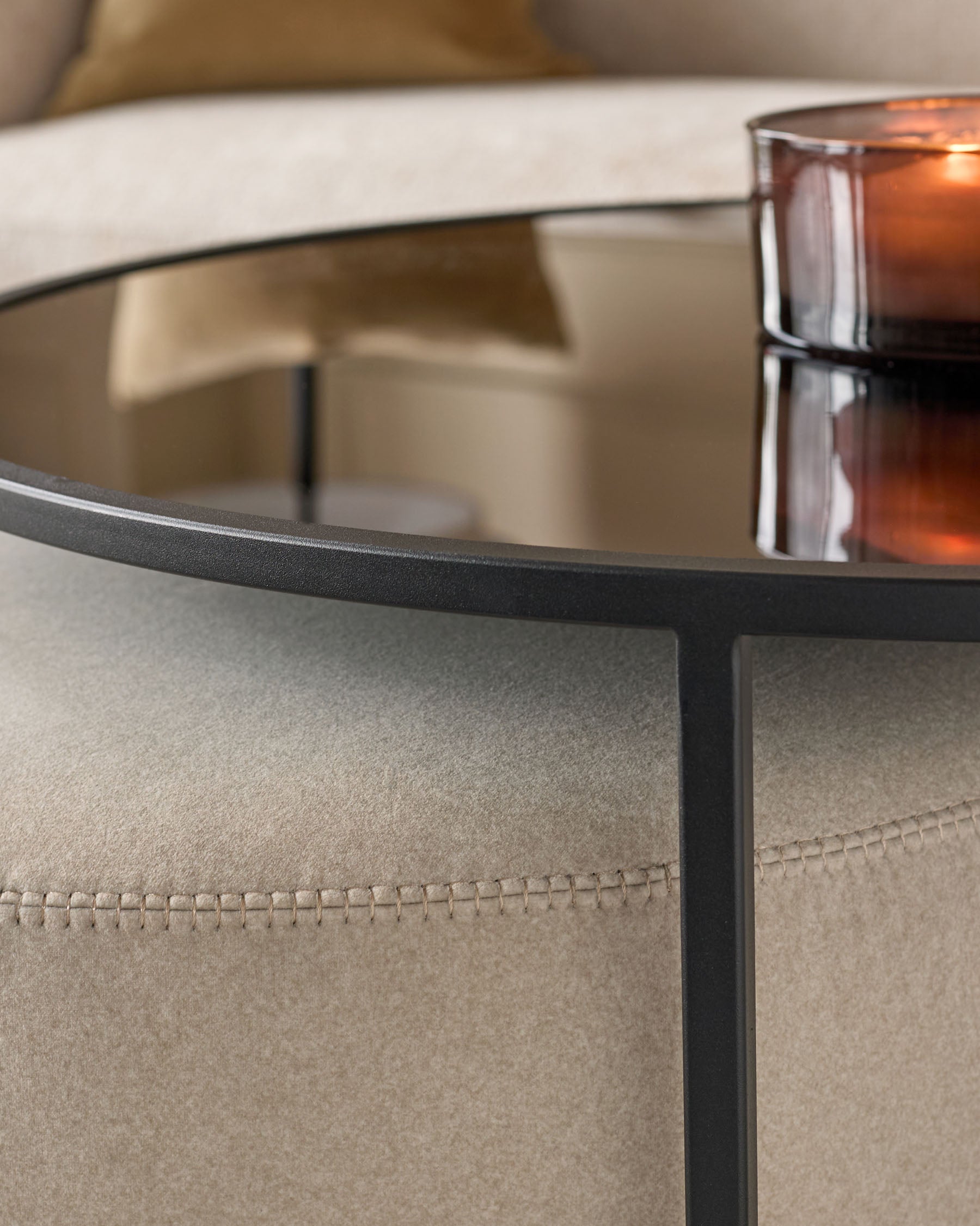 Thea smoked mirror coffee table and cream fabric pouffe set