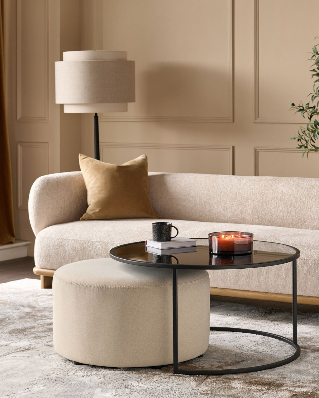 Thea smoked mirror coffee table and cream fabric pouffe set