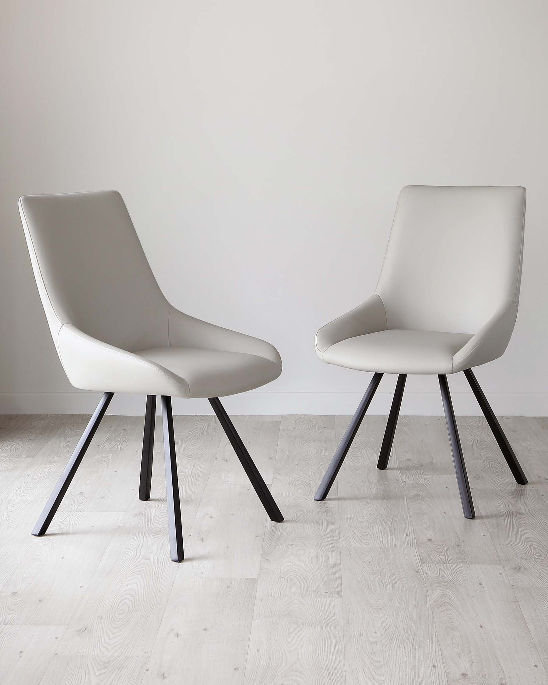 Theo Light Grey Faux Leather Dining Chair With Black Legs
