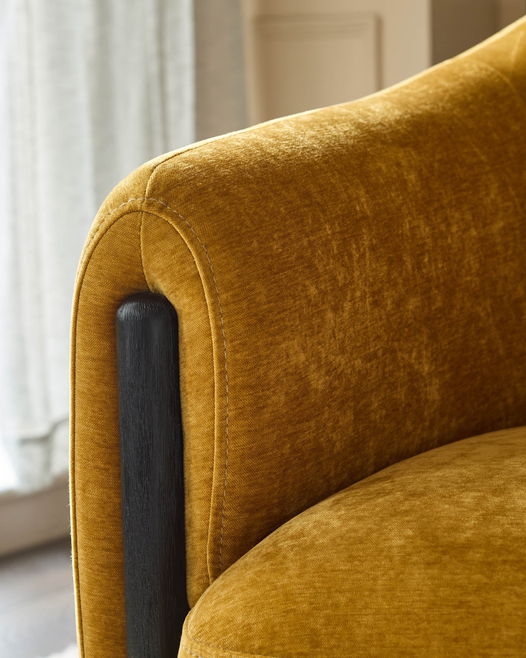 Tristan ochre fabric accent chair with black wood